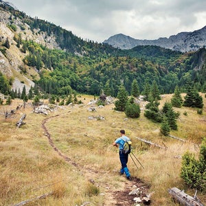 A hiker on the Via Dinarica Trail in the Balkans.