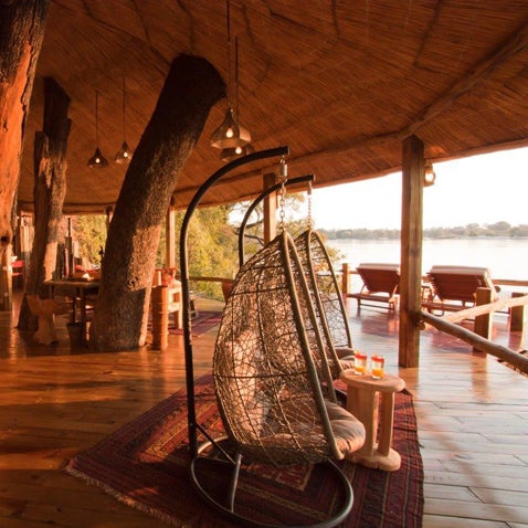 Floating over the Zambezi River in Zambia, built around four ebony trees, and tucked into a basalt riverbank, this tree house exceeds expectations. Read more.