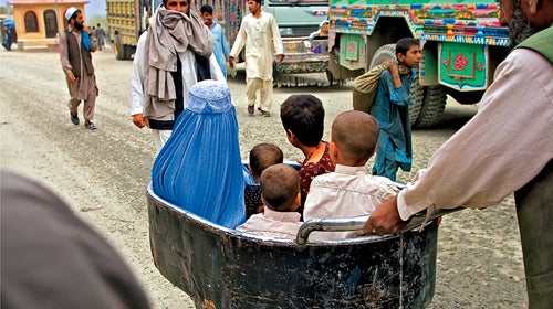 Outside magazine May 2014 Pashtun woman border Pakistan Torkham landays poetry Afghanistan family