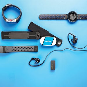 Your run just got wired. Clockwise from top left: Polar V800 watch, Garmin 620 watch, LG HRM headphones, Spree headband, Mio Link heart-rate band, and Wahoo Fitness Tickr Run chest strap.