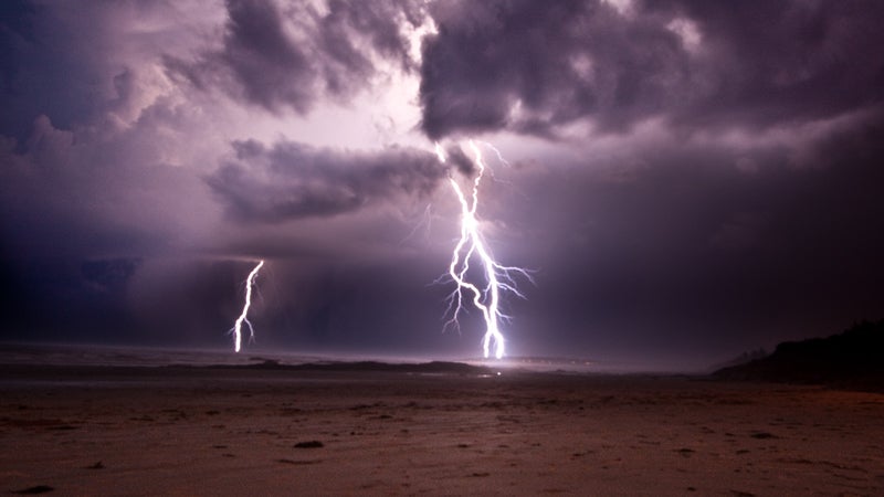 beach lightning ocean water