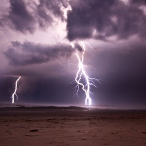 beach lightning ocean water