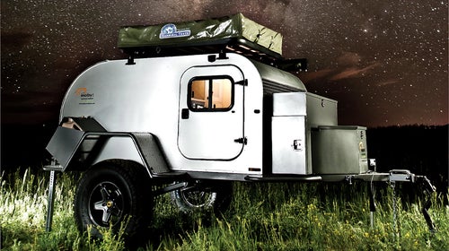 The Moby 1 XTR fits a queen-size mattress, kitchen, power sources, and adjustable suspension into a portable package.