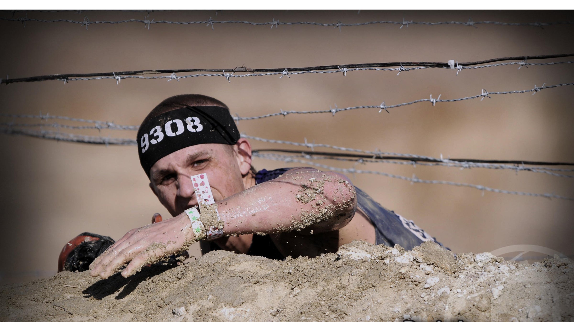 Over the slippery wall and under the barbed wire, to 100 race finishes Brad Kloha goes.