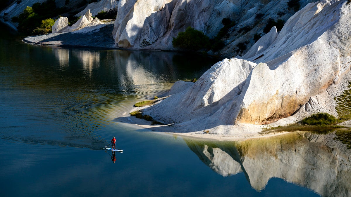 CMPhoto Chris McLennan Chris McLennan Photography New Zealand South Island landscape scenic blue lake st bathans saint bathans sup stand up paddleboard paddle reflection adventure