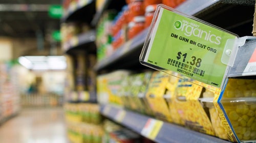 Walmart is scaling up organic food production and distribution, claiming to save customers at least 25 percent.