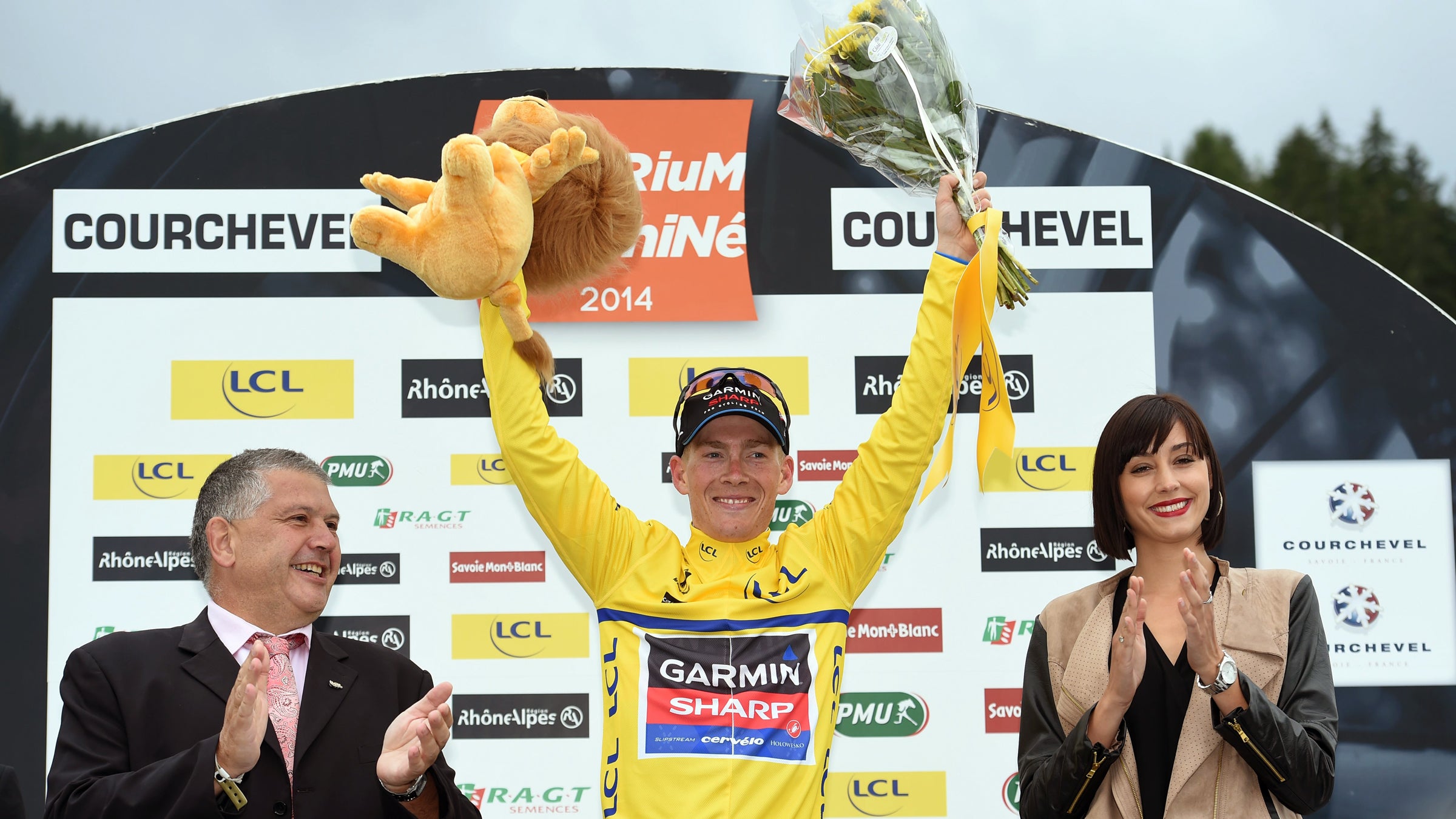 With the way he has been racing, holding a lion on the podium couldn't be more fitting for Andrew Talansky--this guy's a beast. 