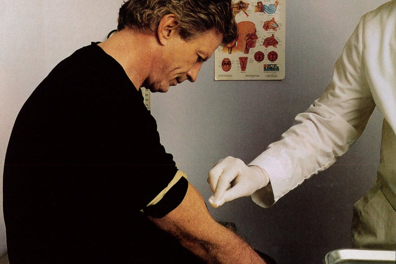 Dr. Jones taking a blood sample from the author.