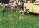 Martin, at age four, winning his first running trophy, in 1985.