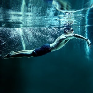 professional swimmer underwater swimming Butterfly