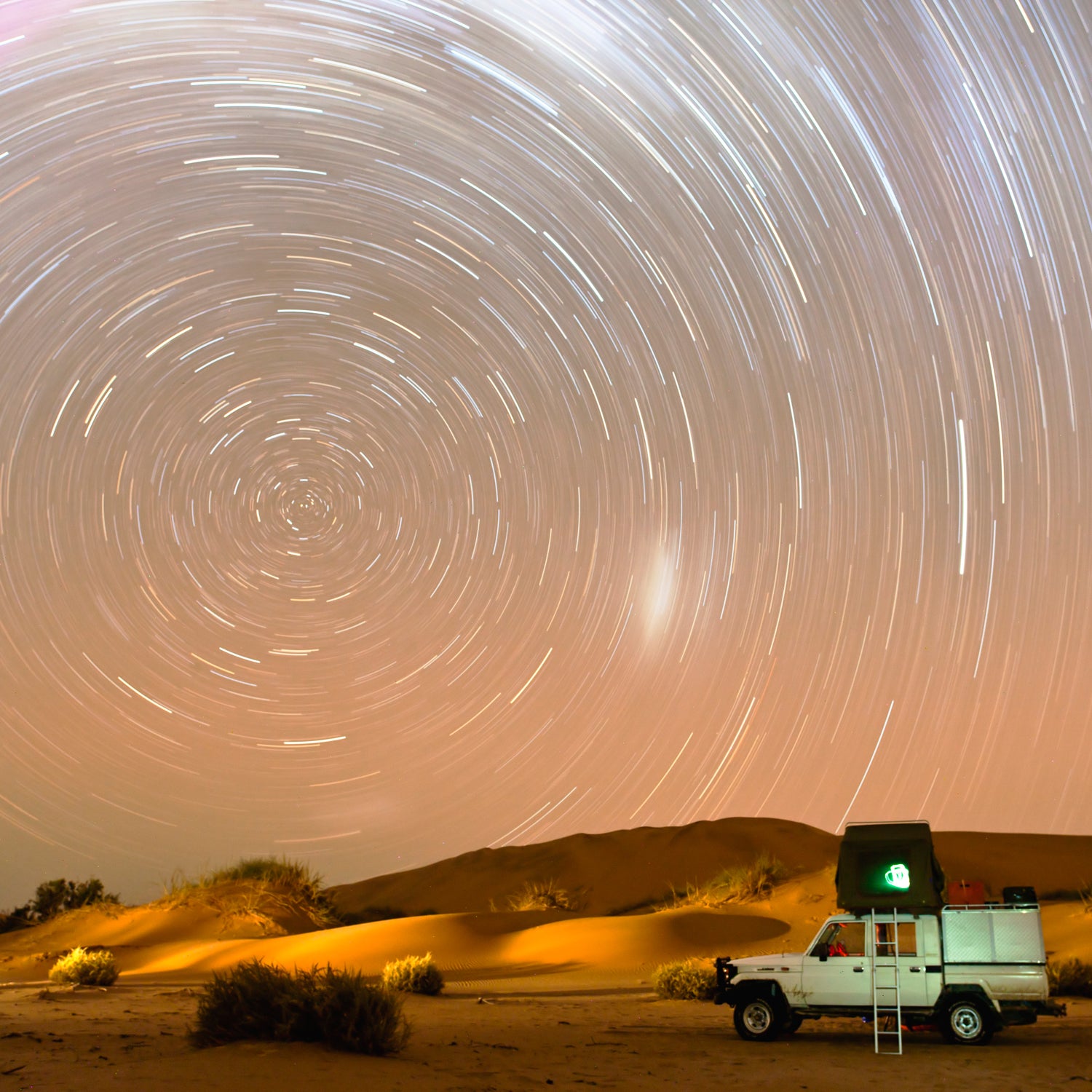 Namibia Africa Skeleton Coast star trails roof tent tourist vehicle campers camping holiday beauty in nature stars movement motion-blur tourism tourist adventure travel remote alone solitary peaceful circular rotation rotate