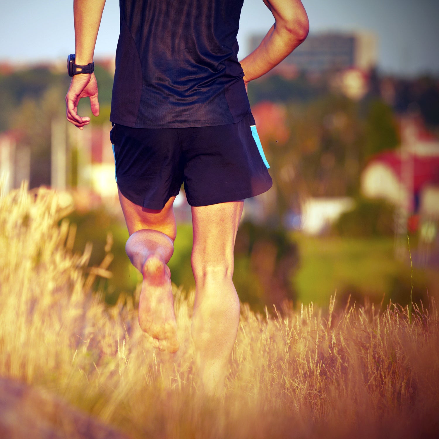 Man Running Barefoot In Water Stock Photo - Download Image Now