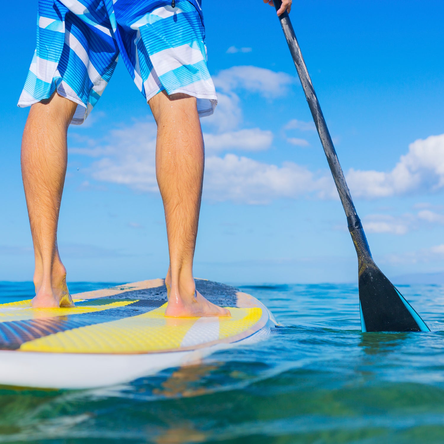 activity beach blue board boarding exercise fit fitness fun hawaii hawaiian healthy holding holiday leisure lifestyle long male men model nature oar ocean outdoor paddle paddleboard paddleboarding people person recreation sea sport sporty stand stand up stand up paddleboard stand up paddleboarding summer surf surfboard surfer surfing tourism travel up vacation water watersport wet young outside outside archives outside magazine outside online the fit list erin beresini ergonomics stand up desk