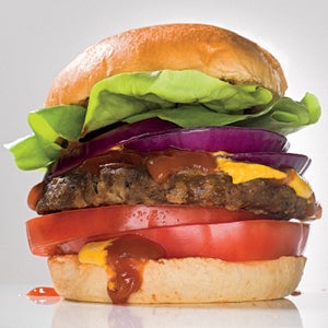 Beyond Meat burger, butter lettuce, tomatoes, onions, ketchup, and mustard