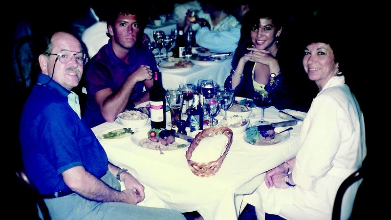 Chris, Walt, Billie, and Carine at dinner after his graduation from Emory University in May 1990.