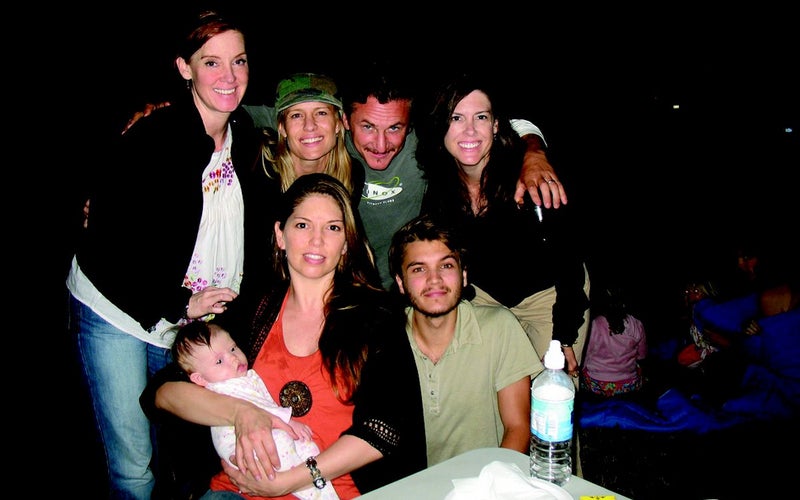 (Clockwise from bottom left) Carine McCandless and her daughter Christiana, Shelly McCandless, Robin Wright, Sean Penn, Shawna McCandless, and Emile Hirsch on the South Dakota movie set of Into the Wild in the summer of 2006.