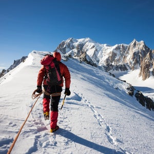 achievement adventure alone alpinist alps backpack mont blanc france europe blue clear sky cliff climber climbing cold expedition exploration Healthy Lifestyle horizontal ice jacket landscape man mountain Mountaineer mountaineering nature one outdoors peak red scenic sky snow snowy sport standing Strength success sun walking winter Enterprise diligence team work alps