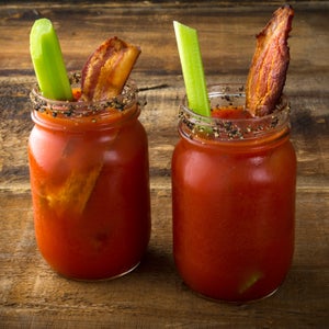 Drink Red alcohol alcoholic bacon bar beverage bloody caesar ceasar celery clamato cocktail cold colorful cool freshness glass jar juice lemon lime liquor mary mason pepper peppers refreshment salt sliced spicey tabasco tomato vegetable vodka wood