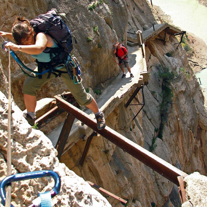 In the El Chorro Gorge in Spain’s Malaga province, the Caminito del Rey (Little King’s Path) hangs 100 feet up on sheer cliffs. The two-mile concrete and steel path was built more than 100 years ago to serve workers on a local hydroelectric plant, but over time it has become a destination for adventure seekers, especially as sections of the pathway have crumbled. Officially closed to the public, hikers still play Fear Factor on the route, which requires spidering over 10-foot sections of missing trail. Even if the state finishes a reconstruction of the path, the Caminito will still stay on the list of top vertigo-inducing trails.