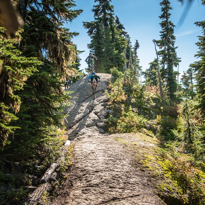 When you’re riding up steep inclines, down rock faces, and through corners, it’s important to move on your bike. Shift your weight forward while climbing to keep the front wheel tracking. Shift your weight back while descending to keep your bike balanced and to keep from being pitched over the handlebars. In tight switchbacks, shift your weight to the outside to counteract the pull to the inside.