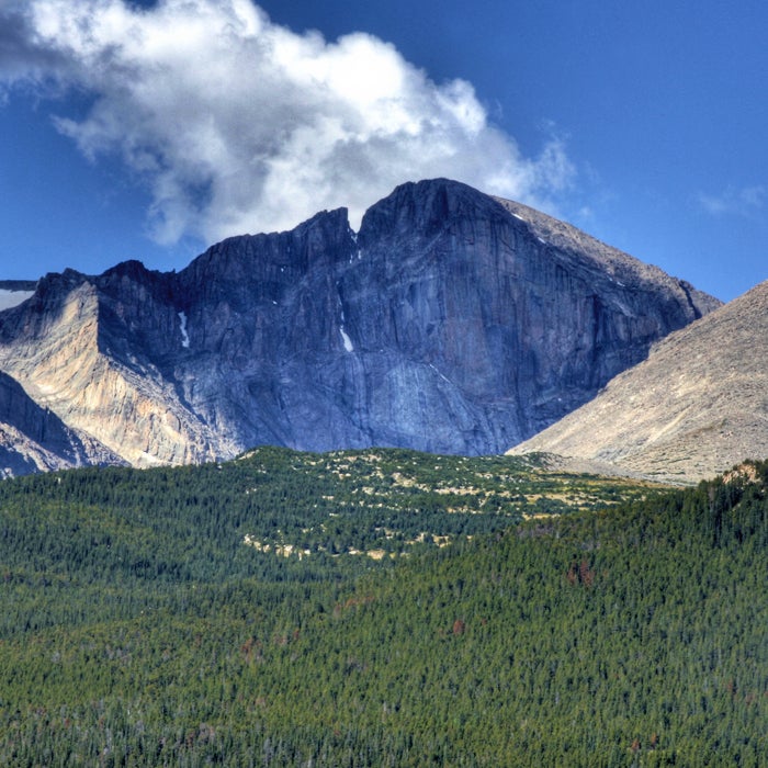One of Colorado's most popular peaks is also one of the deadliest, thanks to high exposure, rock slides, frequent lightning strikes, and narrow ledges. An average of one person a year dies on the mountain, and with a  difficulty rating of Class 3, it's one of the most challenging standard routes up a 14er in the state.
The Longs Peak trail is tame until you reach a section known as the Keyhole. From there, hikers must scramble along narrow ledges, following painted bull's-eyes to stay on course. It's not technical climbing, but it's easy for hikers to get in over their heads.
One of the more famous people to die on Longs Peak was mountaineer Agnes Vaille. After she and a companion successfully summited, Vaille fell 150 feet down a rock field. Exhausted, she told her friend that she would take a short nap before resuming the hike, but she froze to death by the time rescuers found her. Agnes Vaille Shelter, a small cabin on the trail, serves as a memorial to her.