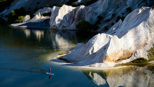CMPhoto Chris McLennan Chris McLennan Photography New Zealand South Island landscape scenic blue lake st bathans saint bathans sup stand up paddleboard paddle reflection adventure 国产吃瓜黑料Online Viewfinder Travel