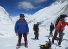 Ueli Steck (right, red jacket) approaches Everest's Lhotse Face, before the conflict at Camp 2 erupted.