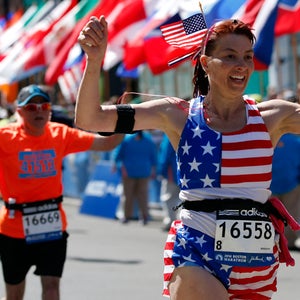 Cynthia Cirri, of New Jersey, crosses the finish line of the 118th Boston Marathon Monday, April 21, 2014.