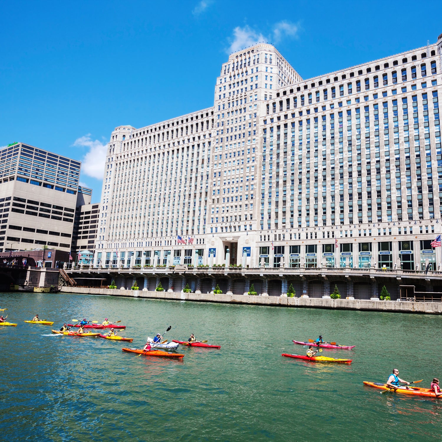 1930s ARCHITECTURE Architectural Detail Architectural Style Art Deco Boat Building Chicago Chicago River City City Break Color Commercial Building Cook County Day Downtown Editorial Famous Place Getaway Horizontal Illinois Landmark Local Landmark Merchandise Mart Midwest Natural Landmark Near North Side OUTDOORS PHOTOGRAPHY People Public Building River Shop Sights Sightseeing Sky Summer Sunny TOURISM TRANSPORTATION Twentieth Century URBAN USA Vintage Wide Angle kayak