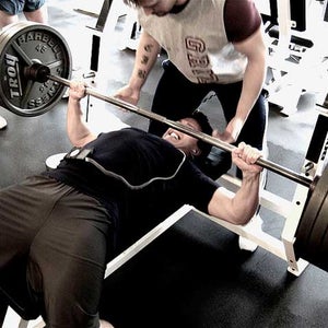 Doing a bench press in the gym