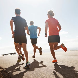 action active activity adult athlete athleticism caucasian challenge competitive sport copyspace cropped determination endurance exercise exercising female fit fitness focus goal group health healthy lifestyle looking male man men outdoors outside people physical activity race road running running shoes sport sportswear tenacity training triathlon wellbeing wellness woman women young young man young woman