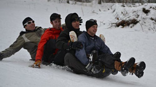 The ԹϺ Adviser sledding on in the Blue Ridge Mountains
