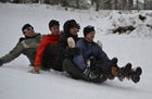 The ϳԹ Adviser sledding on in the Blue Ridge Mountains