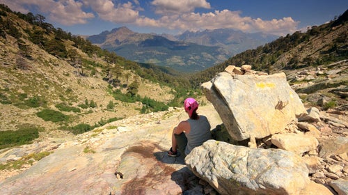 Hiker on the GR20 hiking path in Corsica