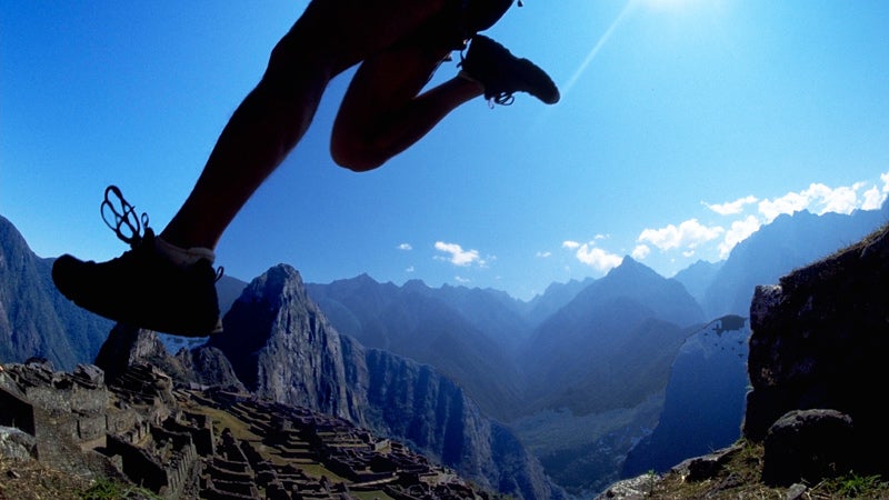 A runner enters Machu Picchu during the Andes ϳԹs Inca Trail Marathon.