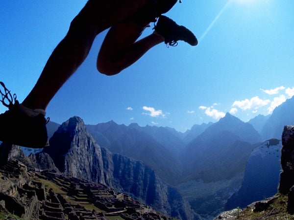 A runner enters Machu Picchu during the Andes Adventures Inca Trail Marathon.