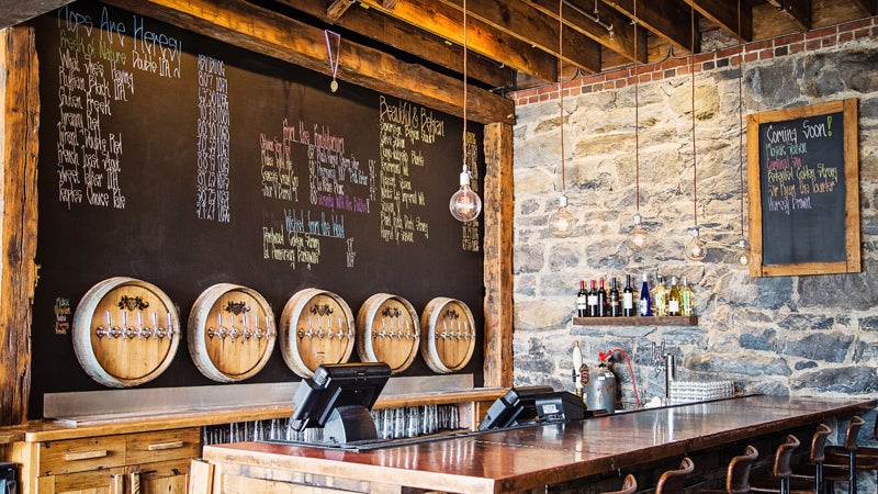 Cardinal Sin Red, Infidel Porter, and Black Angel Cherry Sour are just a few of the brews on tap at Asheville's Wicked Weed Brewing.