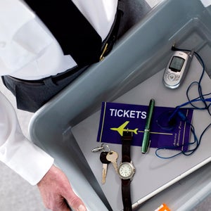 You'll have to relinquish your electronics for a search if requested, but you don't have to give up delicate personal information.