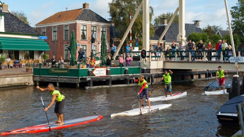 SUP stand-up paddle stand-up paddleboard stand-up paddleboarding ashley biggers travel agent outside magazine outside online escapes netherlands SUP 11-City Tour Anne-Marie Reichman dutch Sloten Workum Franeker Dokkum