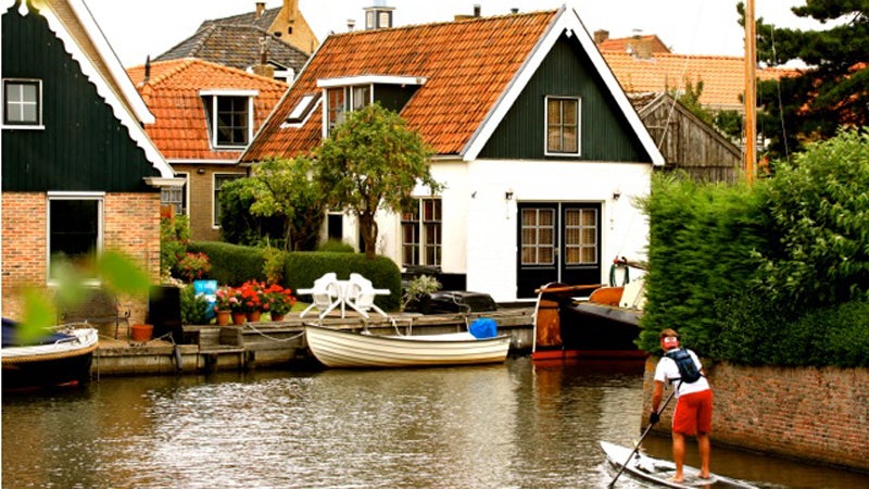 SUP stand-up paddle stand-up paddleboard stand-up paddleboarding ashley biggers travel agent outside magazine outside online escapes netherlands SUP 11-City Tour Anne-Marie Reichman dutch Sloten Workum Franeker Dokkum