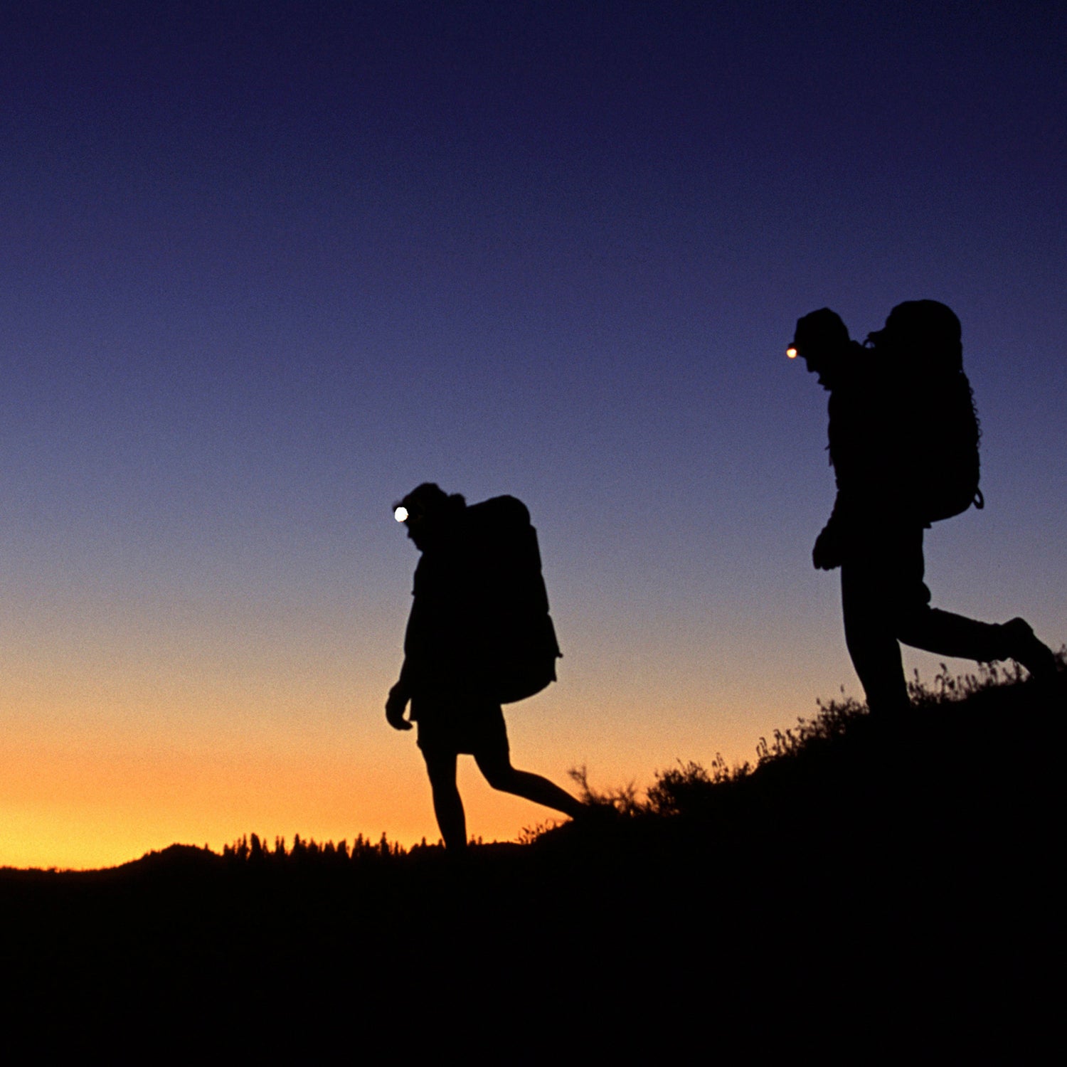 Premium Photo  A head torch light lamp on the person, exploration