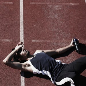 20's active adult alone athlete athletic athletics collapsing copyspace defeated depleted dissapointed dissapointment ethnic exercise exercising exhausted exhaustion finished fit fitness gesturing lane looking up lying down male man men mixed-race muscular outdoors people person professional racing track real relaxing runner serious shadow sport sports sportsman tartan track unhappy upset water bottle young