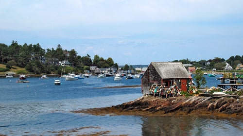 Maine lobster shack shed coast water bay bouy harbor coast coastline fish fishing hut float nautical water vacations travel New England