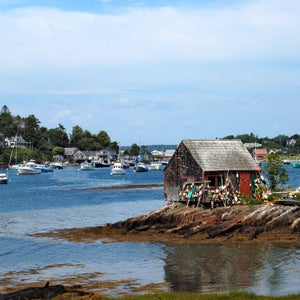 Maine lobster shack shed coast water bay bouy harbor coast coastline fish fishing hut float nautical water vacations travel New England