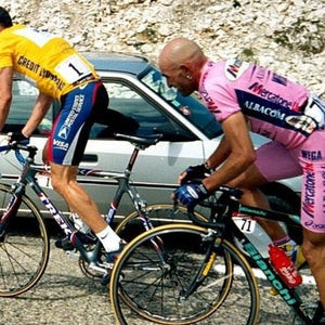 Lance Armstrong and Marco Pantani climb together during the Tour.