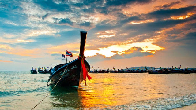 Longboat on the beach; Krabi, Thailand.