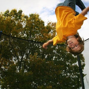 above, action, active, activity, adolescent, air, airborn, backflip, bounce, boy, child, childhood, daring, energy, enjoy, entertainment, exercise, extreme, fitness, flip, freedom, fun, happy, health, height, high, hop, joy, jump, kid, leap, life, lift, male,  movement, net, people, person, physical, play,  playful,  recreation, risk, safety, sports, stretch, trampoline, workout, young, youth,