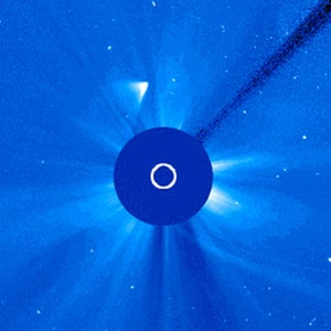 This glowing emergence, less bright than Comet ISON, could either be the comet's nucleus—its icy core—or fragmented remains. NASA states that the latter is more likely.