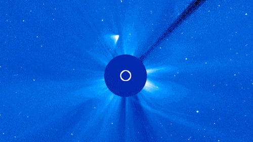This glowing emergence, less bright than Comet ISON, could either be the comet's nucleus—its icy core—or fragmented remains. NASA states that the latter is more likely.