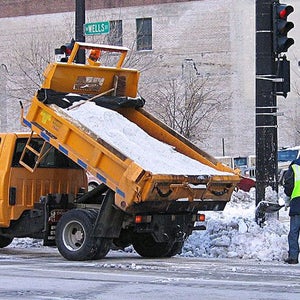 Workers salt truck Milwaukee Wisconsin.